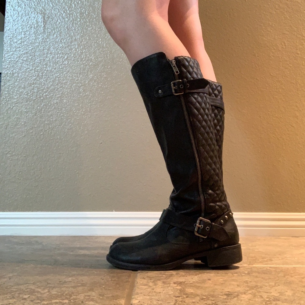 Tall black boots
